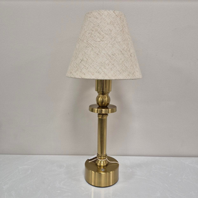 The Rechargeable LED Table Lamp 40cm offers RGBW colour, 3 light levels & tactile switch, an Antique Gold base & Linen Shade adding classic charm