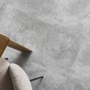 The Ribeira Silver Forma Tile SPC Flooring features sleek tile design, waterproof mineral core, Titanium Nano finish and 25 year warranty