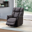 Gunmetal Grey lift & rise recliner chair in a living room setting with a window in the background