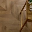 The Rochester Oak Chevron SPC Flooring features elegant chevron design, waterproof mineral core, 25 year warranty and Titanium Nano finish for durability