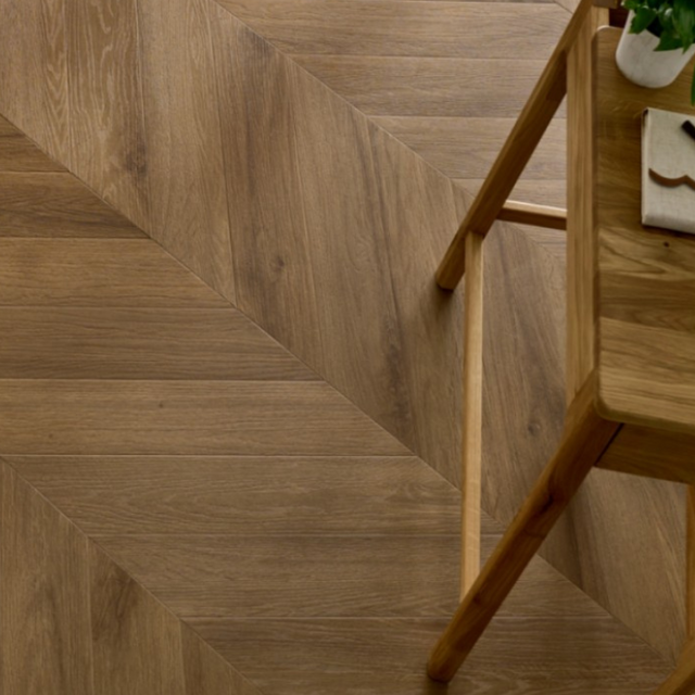 The Rochester Oak Chevron SPC Flooring features elegant chevron design, waterproof mineral core, 25 year warranty and Titanium Nano finish for durability