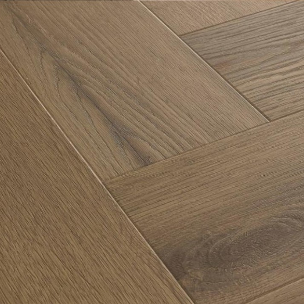 The Rochester Oak Herringbone SPC Flooring features a timeless oak design, suitable for underfloor heating, Titanium Nano finish and a 25 year warranty
