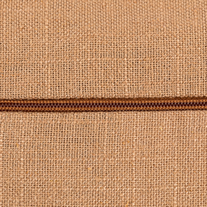The Faye Scatter Box Soft Orange Cushion 43x43cm features a linen blend fabric, a warm orange hue, a sleek knife-edge finish & handcrafted in Ireland.