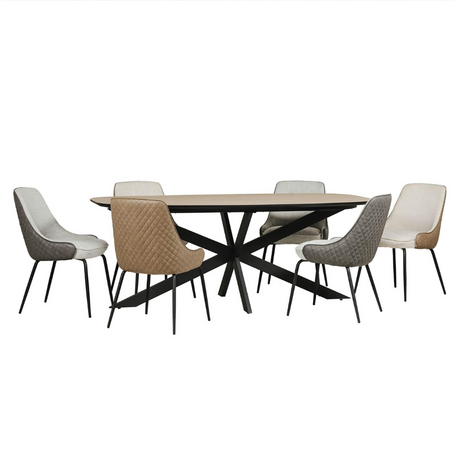 The Sadia Oval Dining Table in Oak features a durable, heat, stain, and scratch-resistant melamine top with a black metal base.
