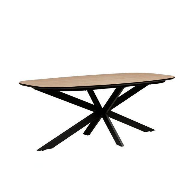 The Sadia Oval Dining Table in Oak features a durable, heat, stain, and scratch-resistant melamine top with a black metal base.