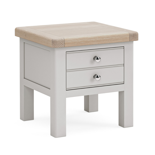 The Salcombe Lamp Table - Light Grey offers a durable oak veneer top, storage drawer, and lower shelf for a modern design.