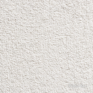 Close-up of a textured white fabric with 'Piano Key' label.