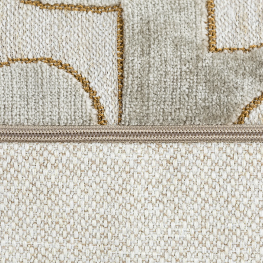 The Scatter Box Carter Natural Cushion 43x43cm features elegant gold detailing, a sleek knife-edge finish a neutral-toned palette & handcrafted in Ireland.