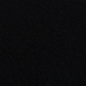Handmade in Ireland, the Scatter Box Cora Cushion 35x50cm in black features a recycled boucle fabric, feather fill and elegant self piped edging