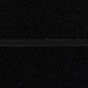 Handmade in Ireland, the Scatter Box Cora Cushion 35x50cm in black features a recycled boucle fabric, feather fill and elegant self piped edging