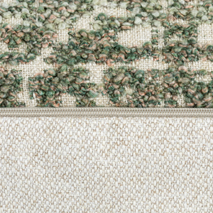 The Esme Scatter Box Green/Rose Cushion 43x43cm features a tactile fabric, subtle rose tones, a sleek knife-edge finish & handcrafted in Ireland.