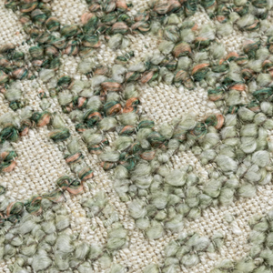 The Esme Scatter Box Green/Rose Cushion 43x43cm features a tactile fabric, subtle rose tones, a sleek knife-edge finish & handcrafted in Ireland.