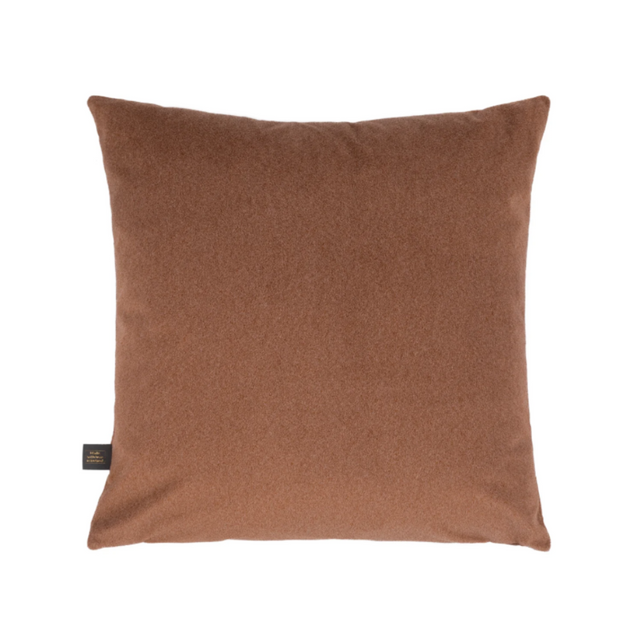 The Liana Scatter Box Rose Cushion 43x43cm features a plush lifted velvet texture, a rose hue, a sleek double-sided knife-edge finish & handmade in Ireland.