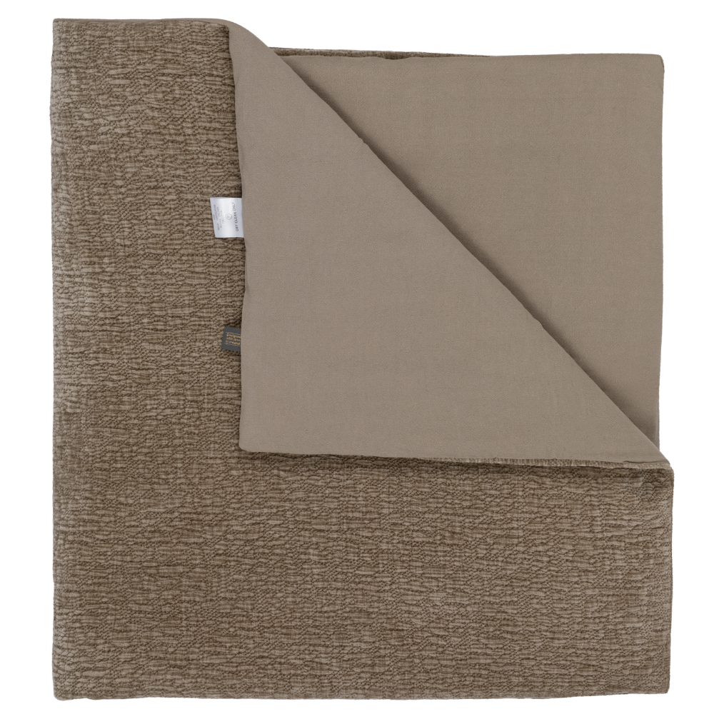 The Scatter Box Piper Throw 130x270cm in Natural features ripple-textured velvet, a sleek knife-edge finish , a generous size & is handcrafted in Ireland.