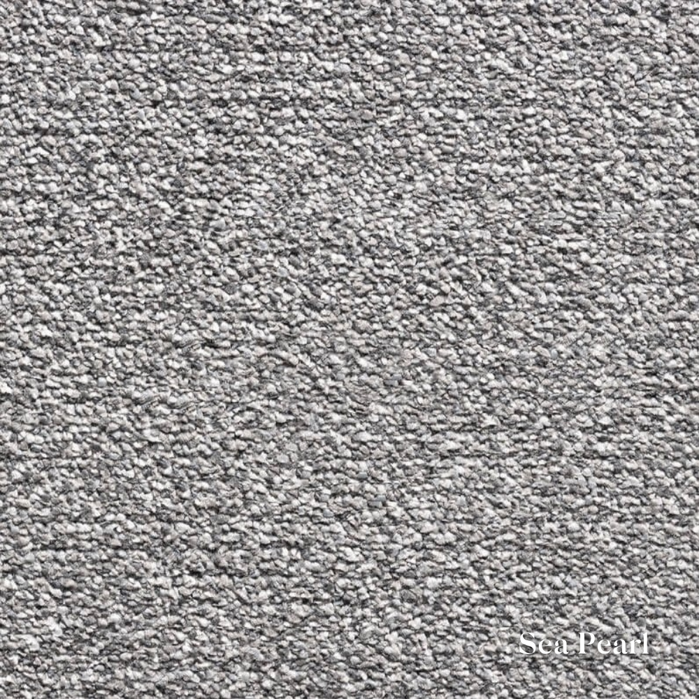 Close-up of gray textured carpet with 'Sea Pearl' branding.