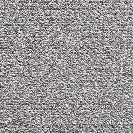 Close-up of gray textured carpet with 'Sea Pearl' branding.