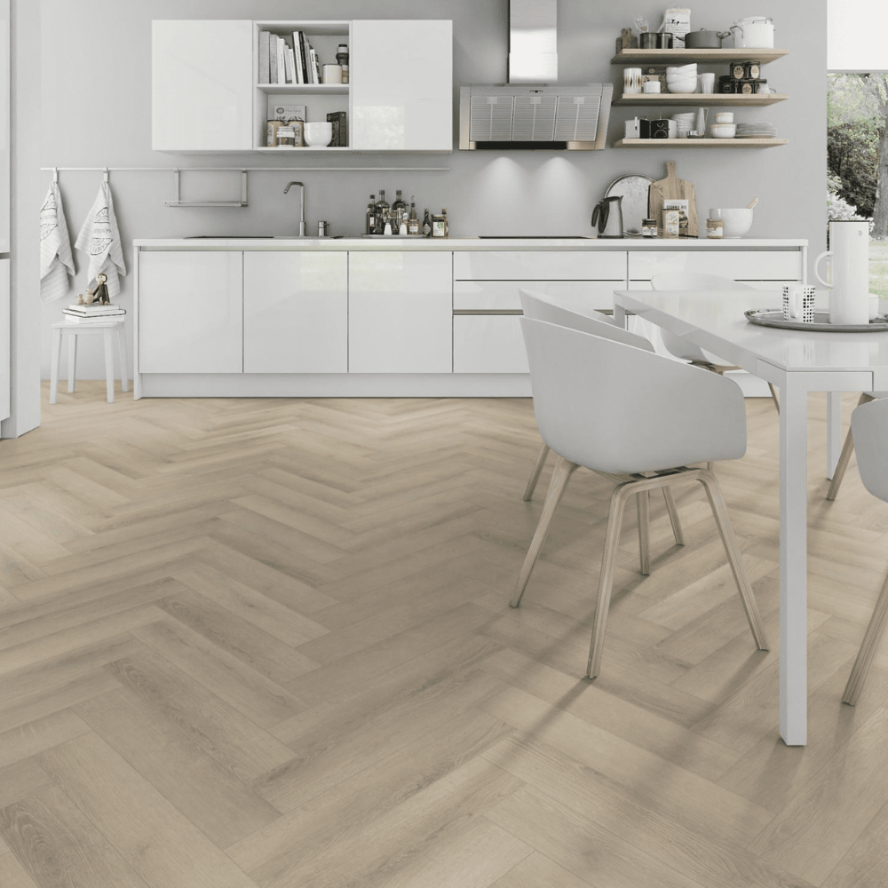 The Seashell Oak Herringbone SPC Flooring - 4mm SPC core, waterproof, sound-reducing underlayment and a 20-year guarantee.
