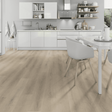The Seashell Oak SPC Flooring - 4mm, waterproof, oak finish, Class 33 wear rating and sound-reducing underlayment for any space.