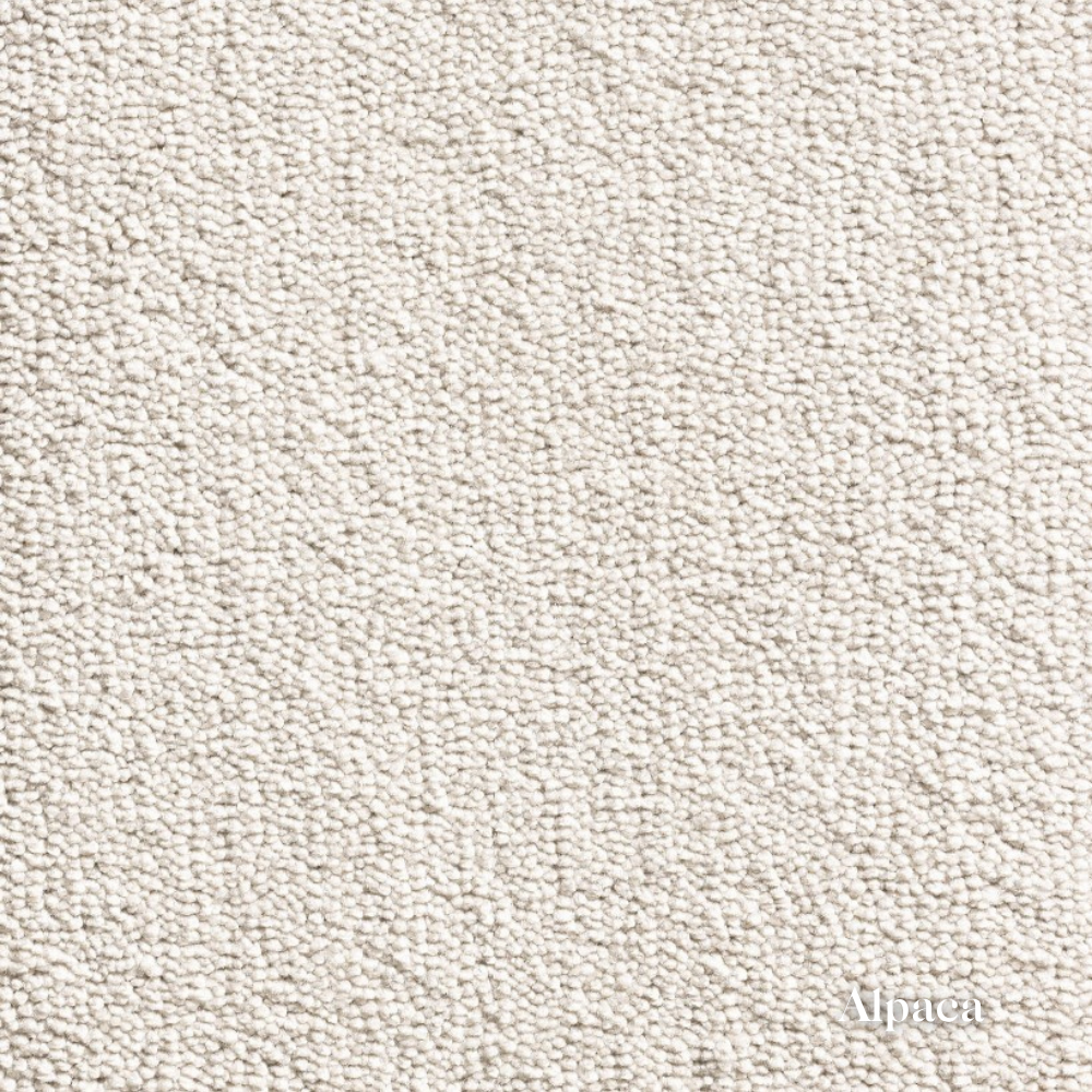 Close-up of a textured beige fabric with 'Alpaca' branding.
