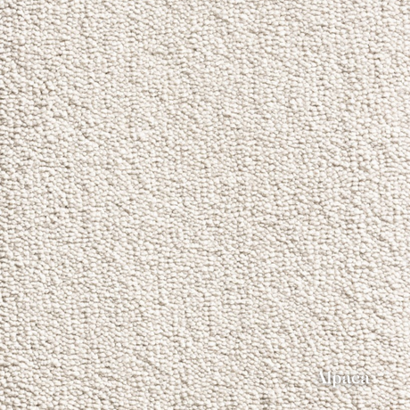 Close-up of a textured beige fabric with 'Alpaca' branding.