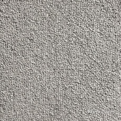 Close-up of gray carpet texture with 'Rhinoceros' branding.