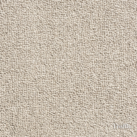Close-up of beige carpet texture with 'Truffle' brand name.