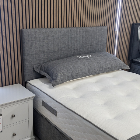 The Sleep Tight Headboard in Linen Steel features soft upholstery, plush padding and elegant Irish craftsmanship for timeless bedroom comfort