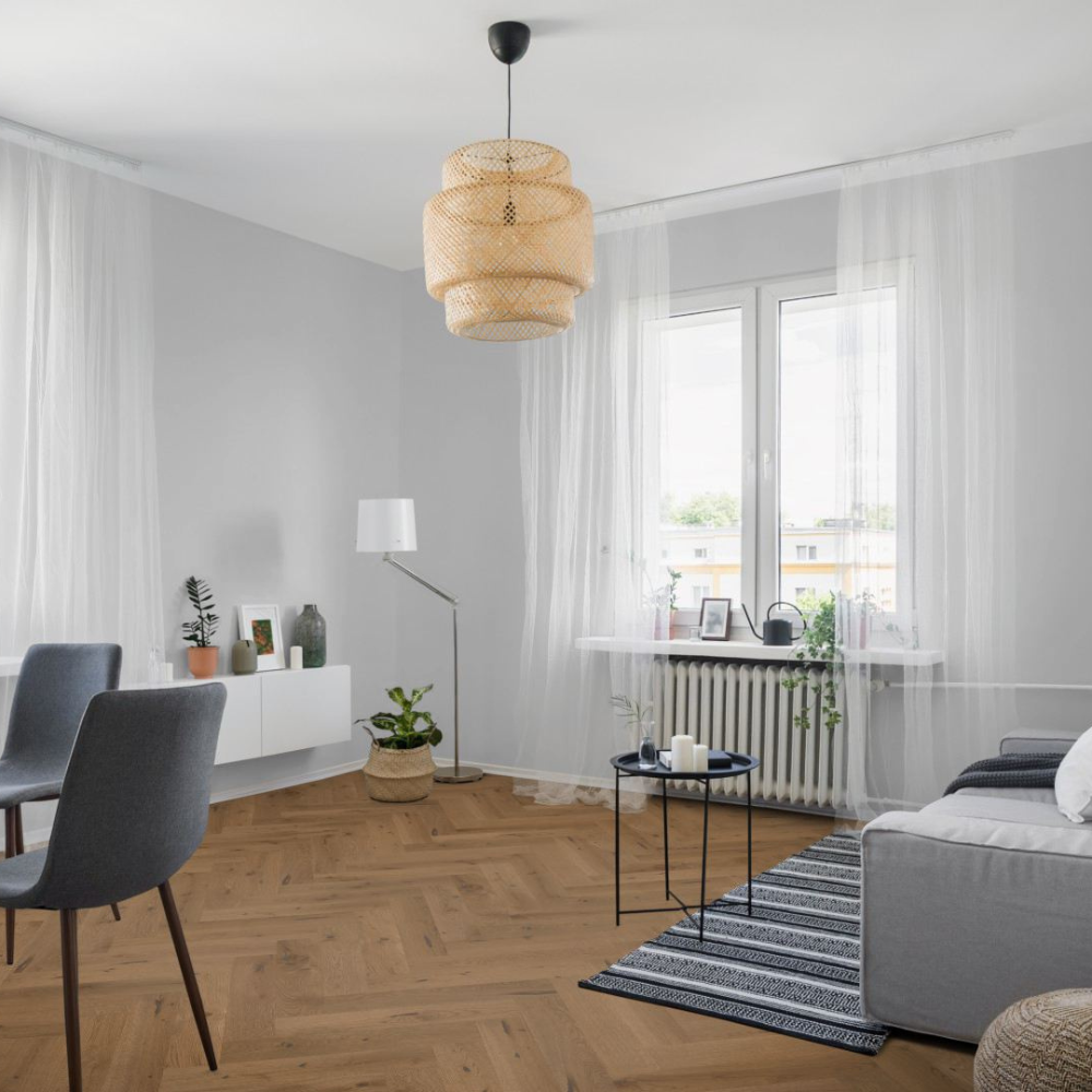 The Smoked White Oak Herringbone Engineered Flooring - 15mm features rich smoked tones, soft white grain, durable multi layer build and easy installation
