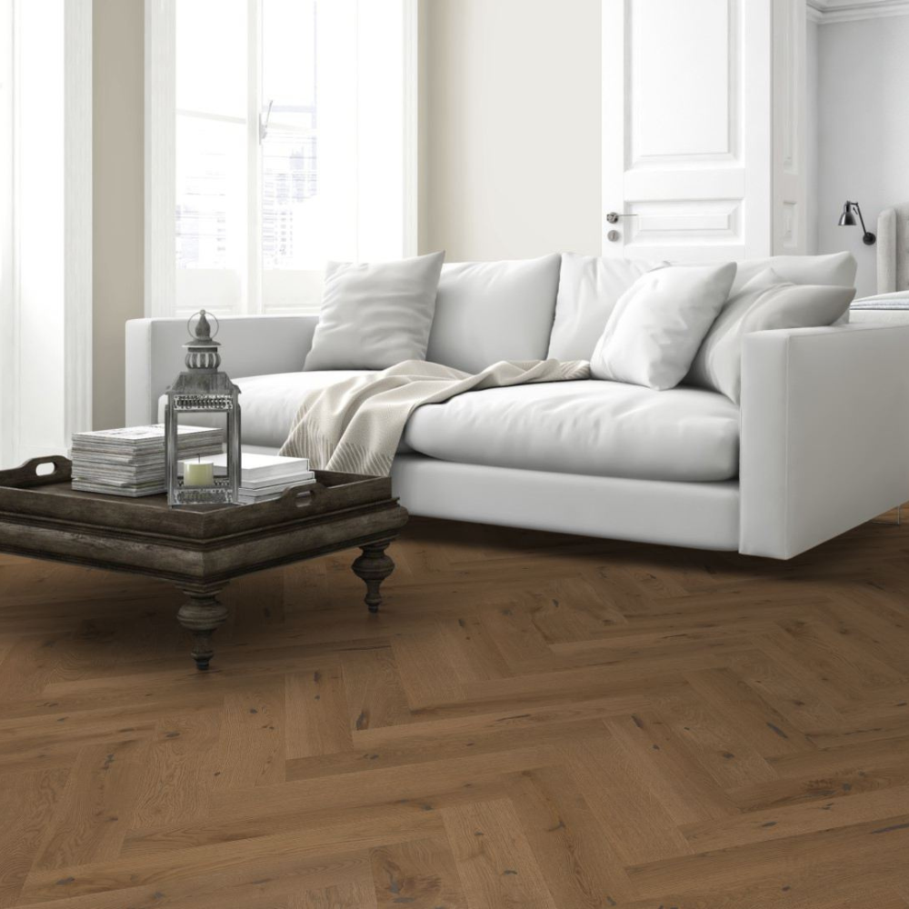 The Smoked White Oak Herringbone Engineered Flooring - 15mm features rich smoked tones, soft white grain, durable multi layer build and easy installation
