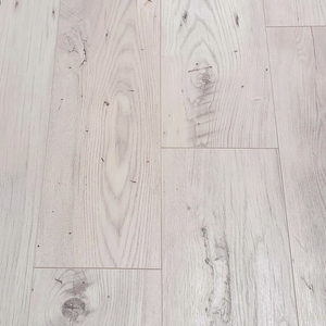 The Sound Chillout Oak Laminate Flooring - 12mm features AC5 durability, seamless installation, and a 30-year warranty included.