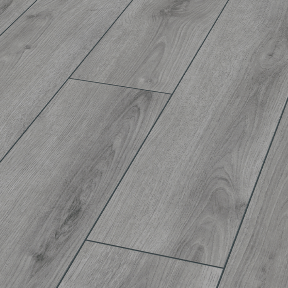 Summer Oak Grey Laminate Flooring - 12mm, AC5-rated, photorealistic grey oak finish, durable and easy 'Clic' installation.