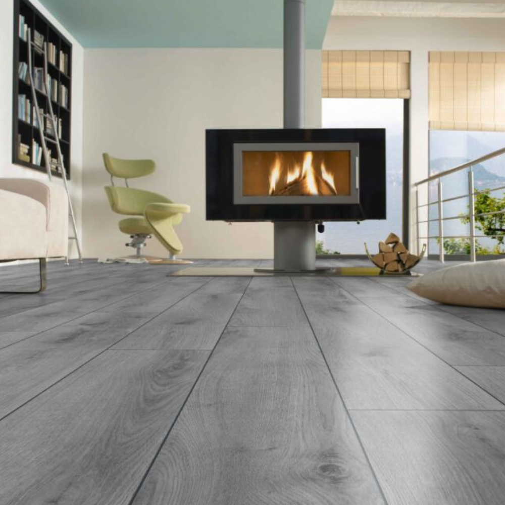 Summer Oak Grey Laminate Flooring - 12mm, AC5-rated, photorealistic grey oak finish, durable and easy 'Clic' installation.