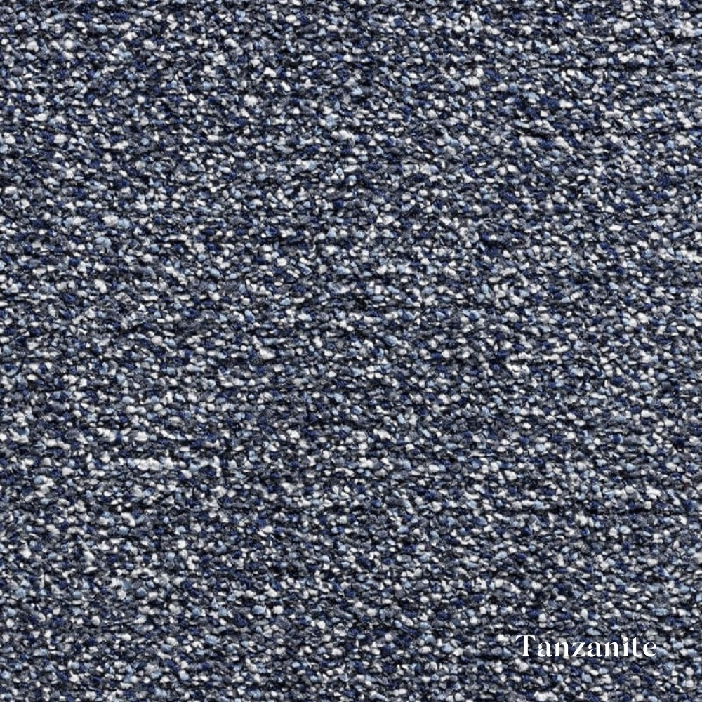 Textured blue surface with 'Tanzamite' branding