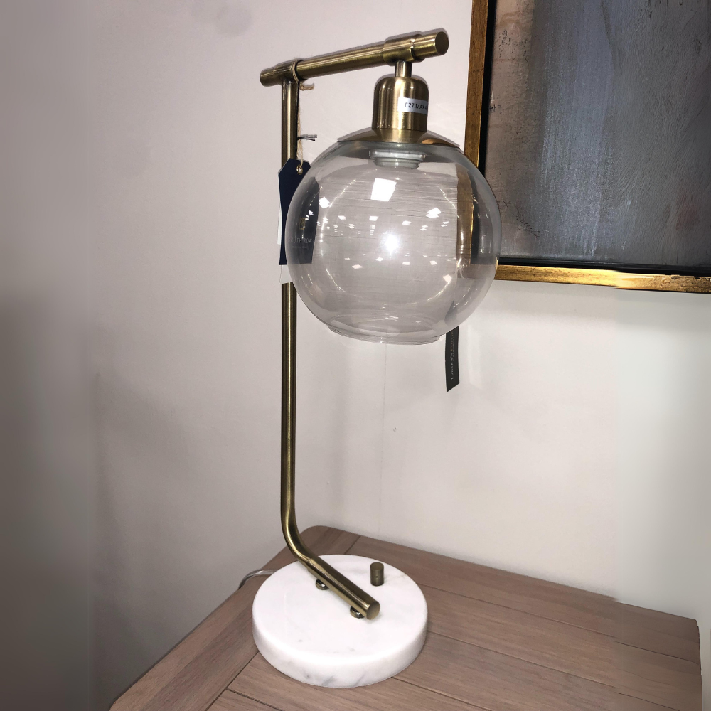 The Globe Table Lamp – a timeless and versatile lighting solution for any space with a spherical globe design