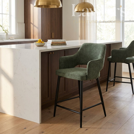 Modern kitchen with a white island and green bar stools