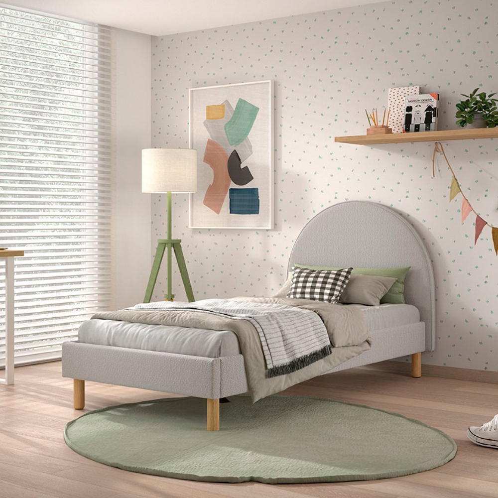 The Moon Kids Bed 90 x 200cm in Grey Boucle features a rounded headboard, soft upholstery and durable frame that is both cozy and stylish for any child