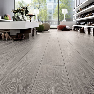 The Timeless Oak Grey Laminate Flooring - 12mm, AC5-rated, sleek grey oak finish, durable, eco-friendly and 5G Click install.