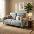 Gray 2 seater sofa set with colorful cushions in a living room setting