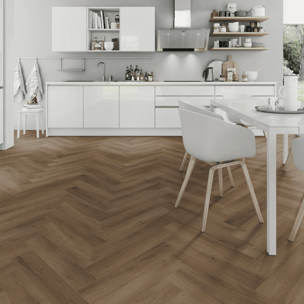 Truffle Oak Herringbone SPC Flooring - 4mm, waterproof, SPC core, sound-reducing underlayment and herringbone pattern.
