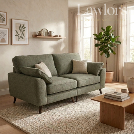 Green 4 seater fabric sofa in a living room