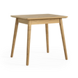 The Valencia Bistro Dining Table in solid oak with tapered legs that is compact, stylish and perfect for cozy dining spaces or breakfast nooks