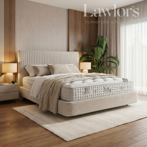 Bedroom with a mattress on a bed pack surrounded by decor elements