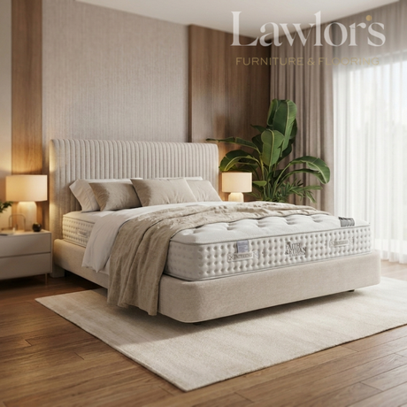 Bedroom with a mattress on a bed pack surrounded by decor elements