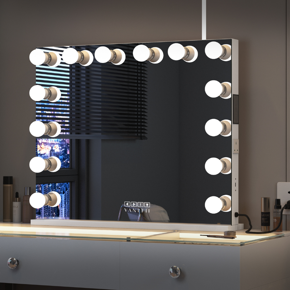 The Vanitti Eva 18 Drawer Dresser & 14 Bulb Hollywood Mirror Set features LED lighting, Bluetooth speaker, USB/Type-C ports and adjustable brightness