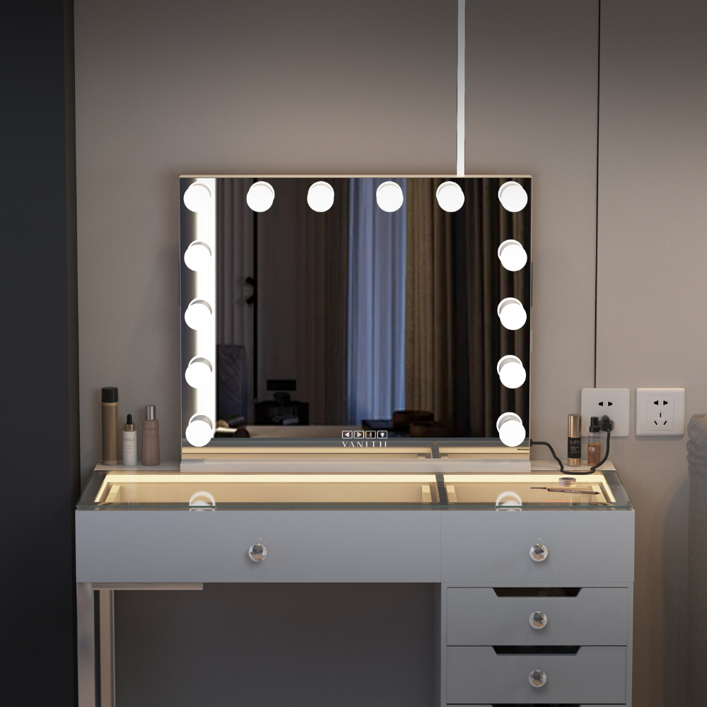 The Vanitti Eva 18 Drawer Dresser & 14 Bulb Hollywood Mirror Set features LED lighting, Bluetooth speaker, USB/Type-C ports and adjustable brightness