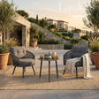 Outdoor garden furniture patio set with two chairs and a table on a patio