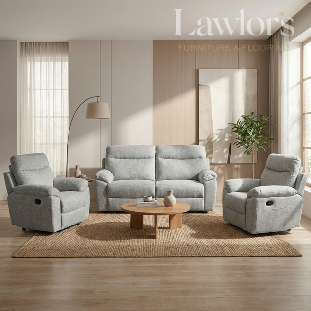 Light grey 3+1+1 recliner sofa set with matching armchairs in a living room setting
