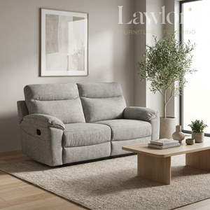 Dark brown 2 seater recliner sofa in a living room with a coffee table and decorative items