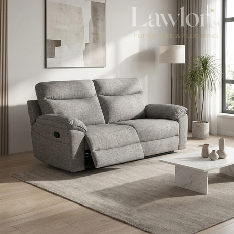 Dark brown 3 seater recliner sofa in a living room with a coffee table and decorative items