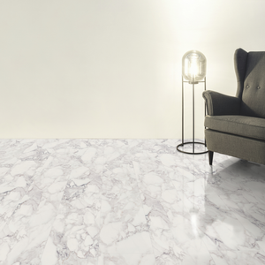 Living room with grey sofa and floor lamp on a marble effect laminate flooring